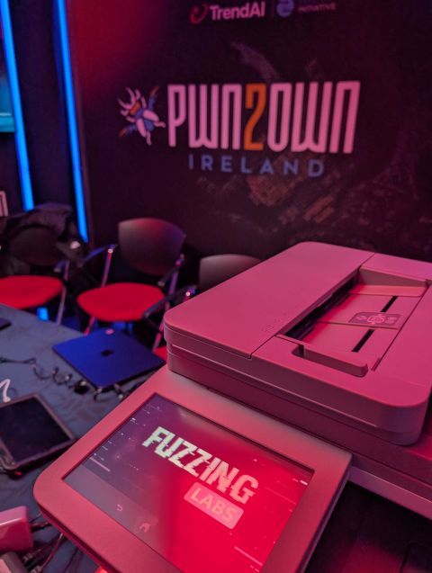 The Brother MFC-L8970CDW screen showing the FuzzingLabs logo at Pwn2Own Ireland 2026